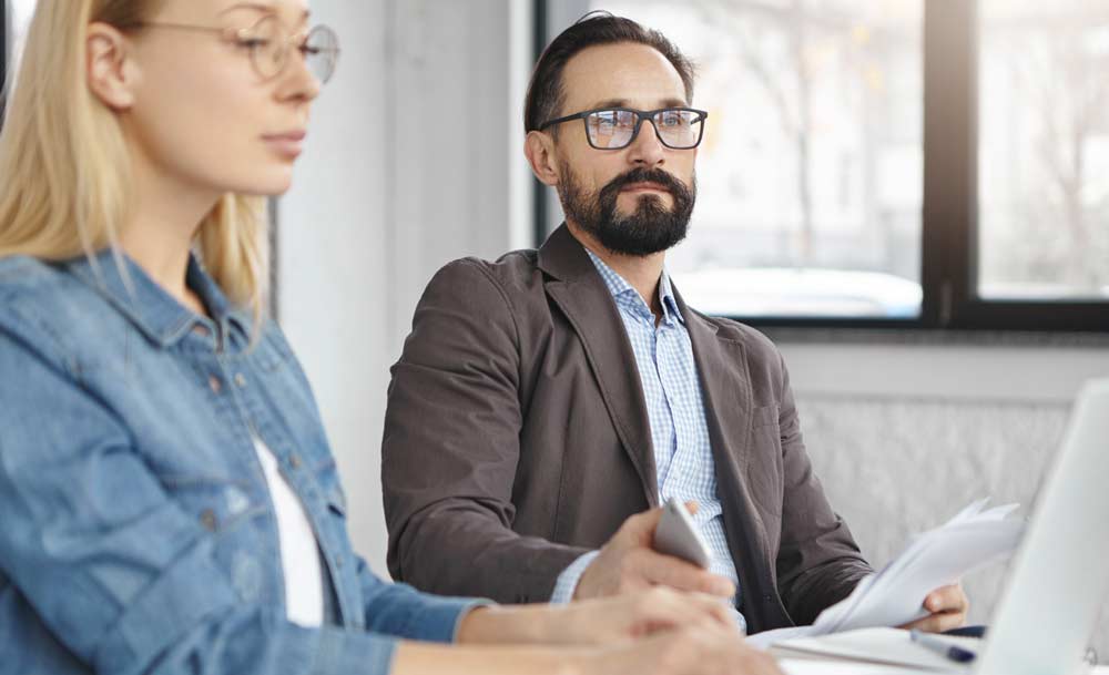Business partners working in office
