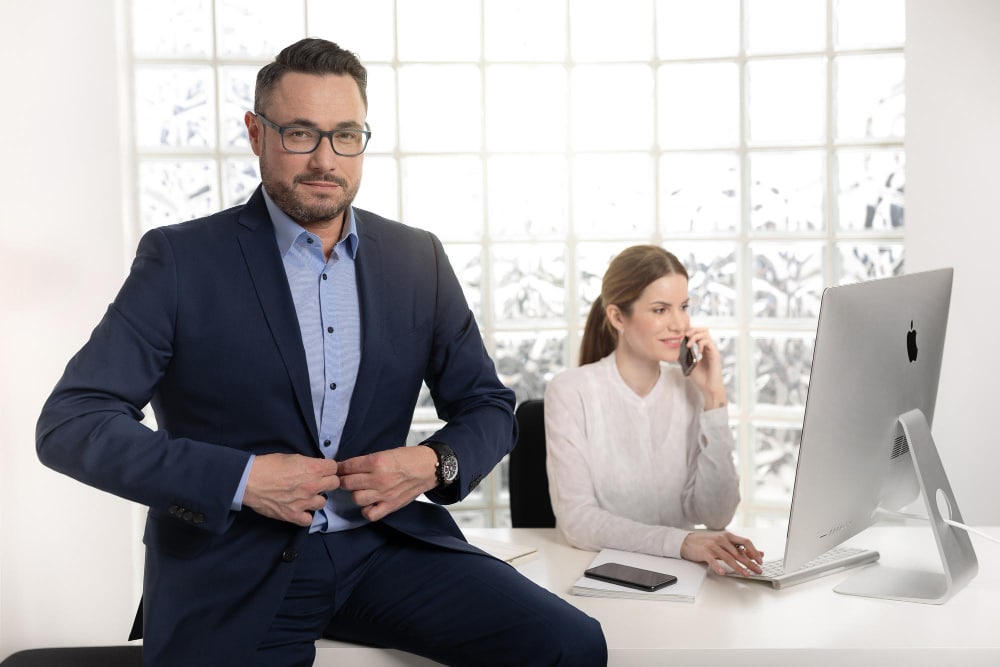 c-level executive assistant supporting a CEO with calendar management and strategic planning in a modern office